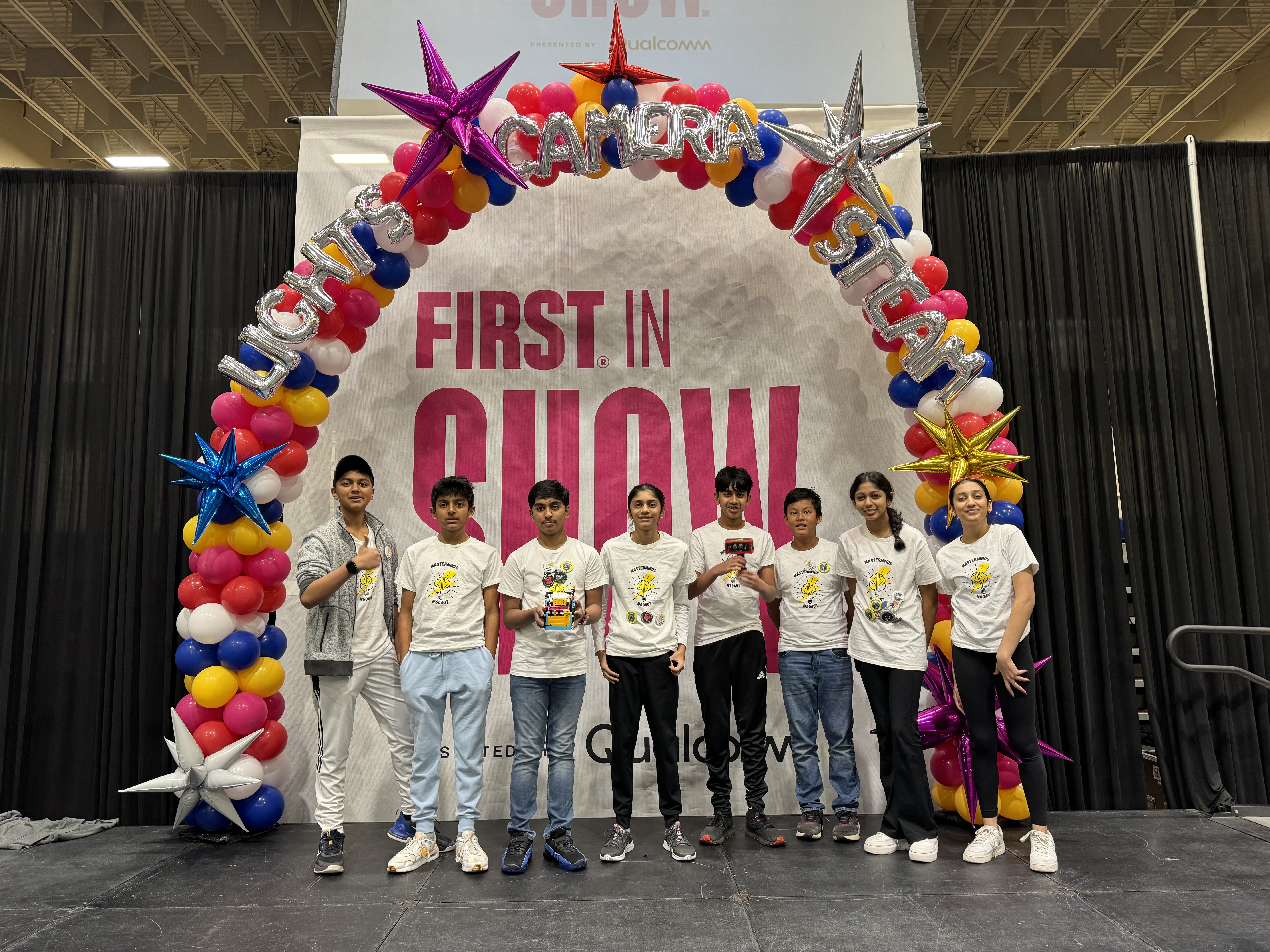 Robotics teams with shirts with brain icon